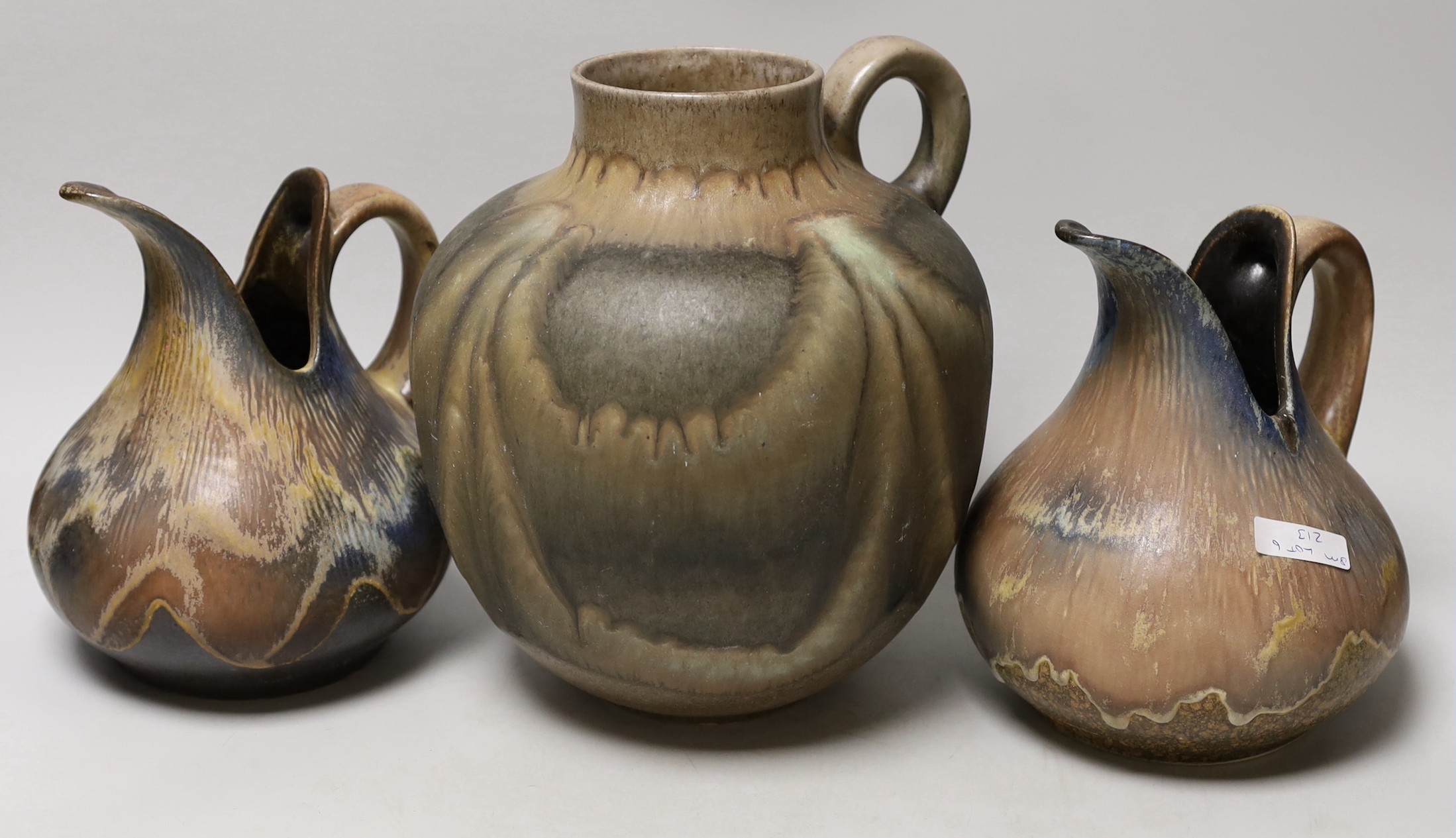 Three West German art pottery items; a pair of Dümler & Breiden, and a large ewer. Tallest 24cm